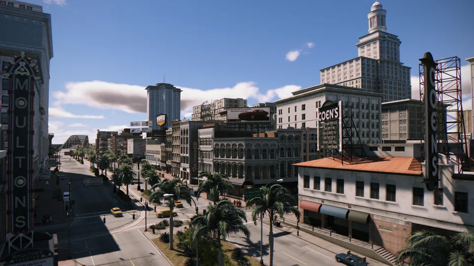 Downtown New Bordeaux in daylight, with palm trees and 1960s architecture