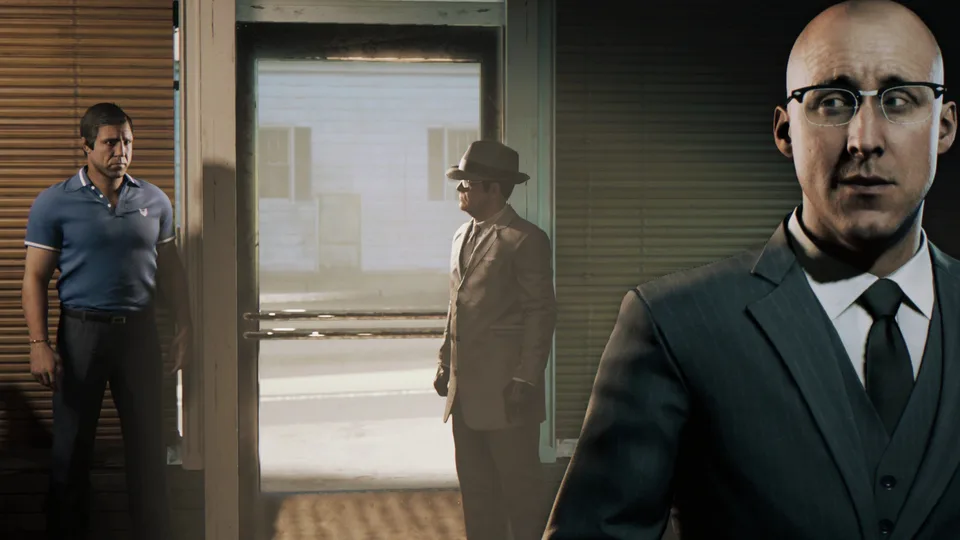 Two men in suits talking outside a building in Mafia III