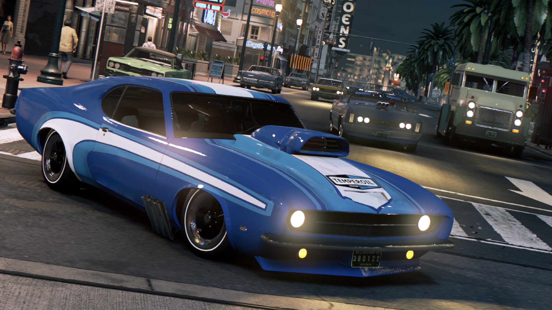 A blue muscle car with its headlights on at night in Mafia III